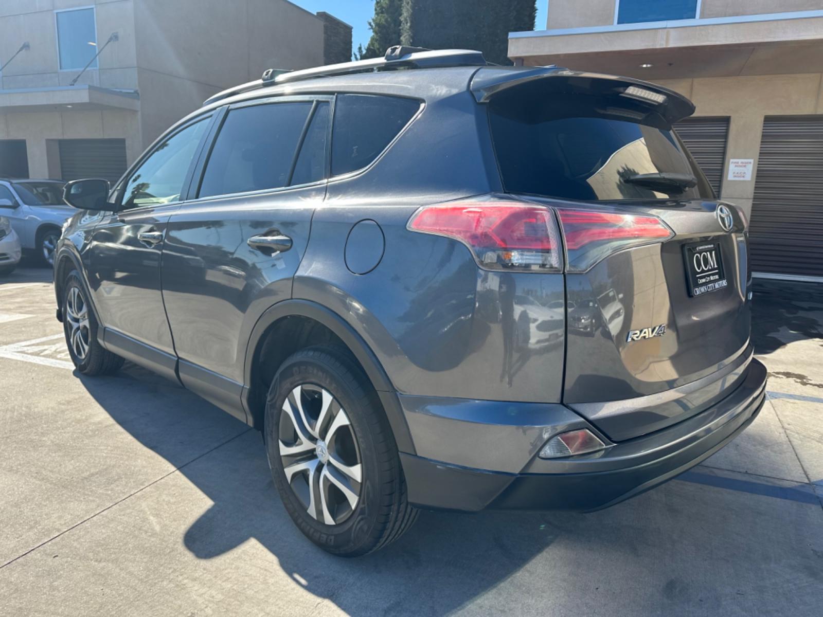 2016 Gray /Black Toyota RAV4 (JTMZFREVXGJ) , AUTOMATIC transmission, located at 30 S. Berkeley Avenue, Pasadena, CA, 91107, (626) 248-7567, 34.145447, -118.109398 - Crown City Motors is a used “Buy Here Pay Here” car dealer in Pasadena CA. “Buy Here Pay Here” financing, means that when you purchase your vehicle from our dealership, that you make the payments to the dealership as well. We do not need the banks approval to get you approved for a used auto - Photo #2